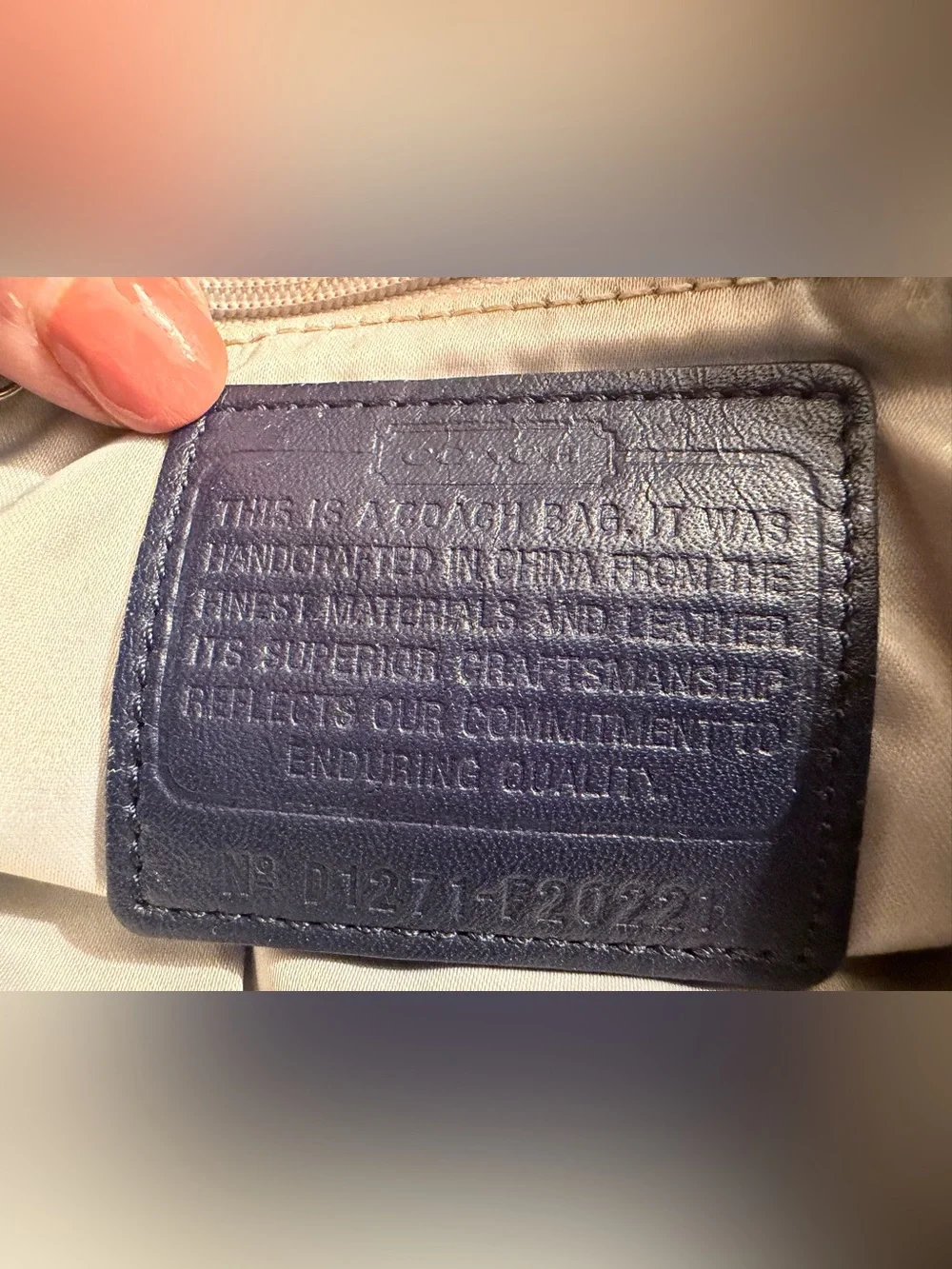Coach navy , gray & metallic silver signature jacquard with navy leather trim.